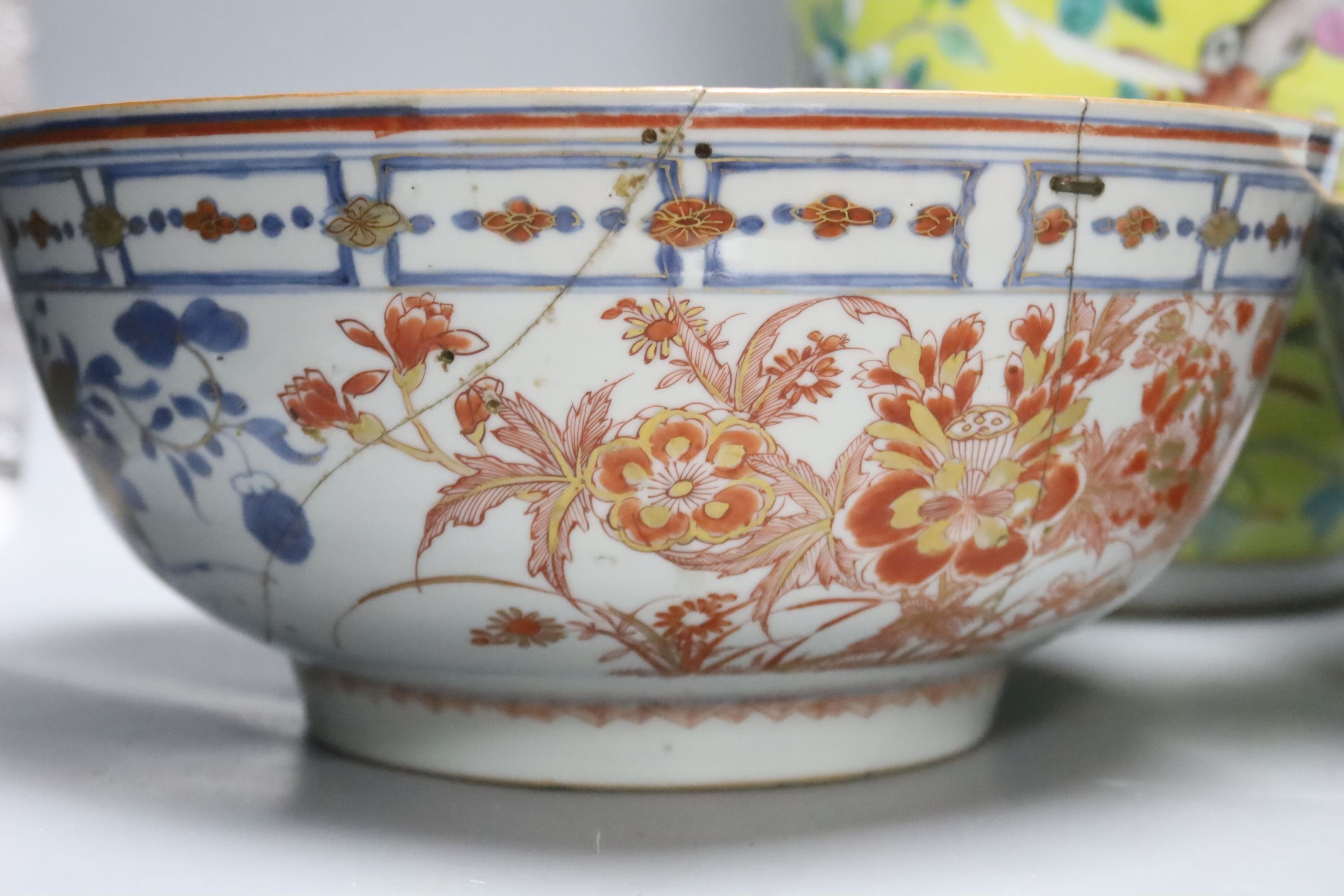 A large 19th century Chinese yellow ground vase and two 18th century Chinese porcelain bowls, diameter 26cm (a.f)